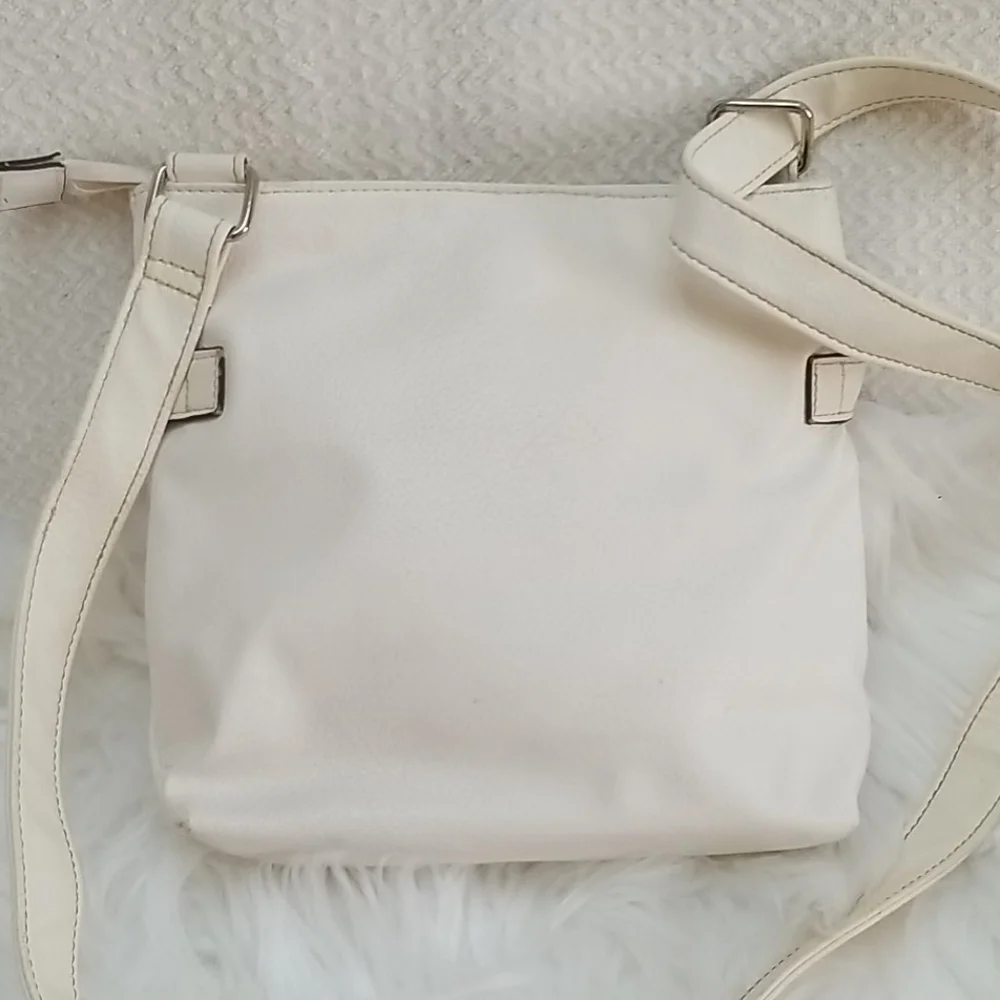 Rosetti white pebbled faux leather cross body bag